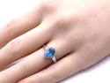 9ct White Gold Blue Topaz & Diamond Halo Ring
