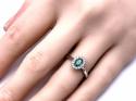 Platinum Emerald & Diamond Halo Ring