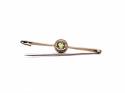 An Old Peridot Solitaire Bar Brooch