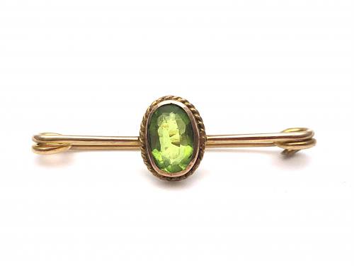 An Old 9ct Synthetic Peridot Brooch