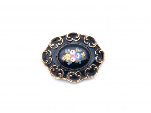 An Old Black Enamelled Brooch