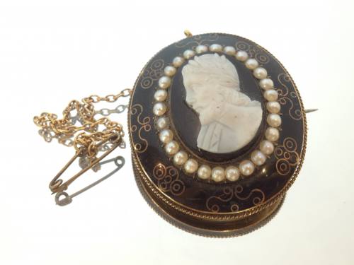 A Victorian Seed Pearl Black Cameo Brooch