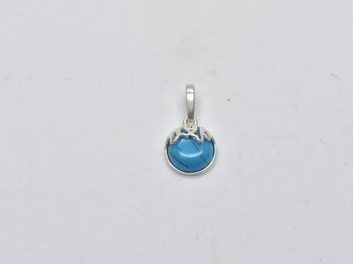 Silver Reconstituted Turquoise Shaped Pendant