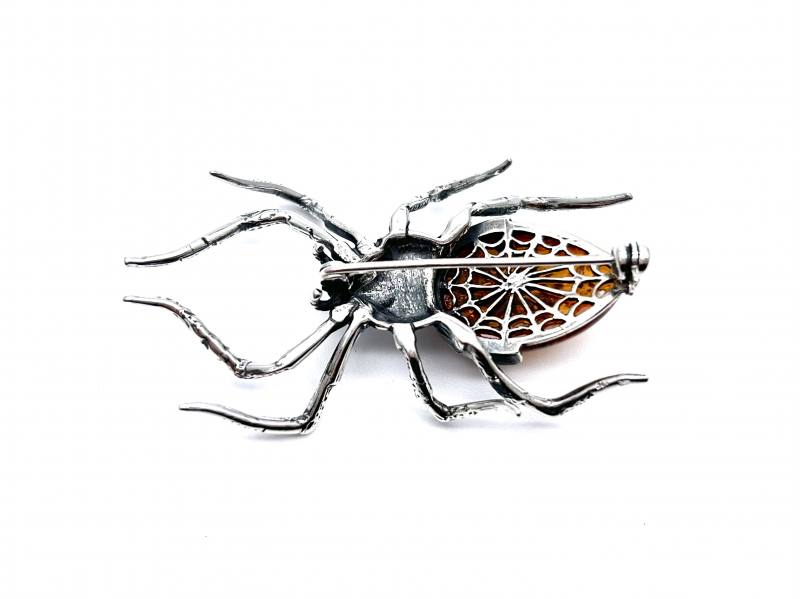 Silver spider brooch sales